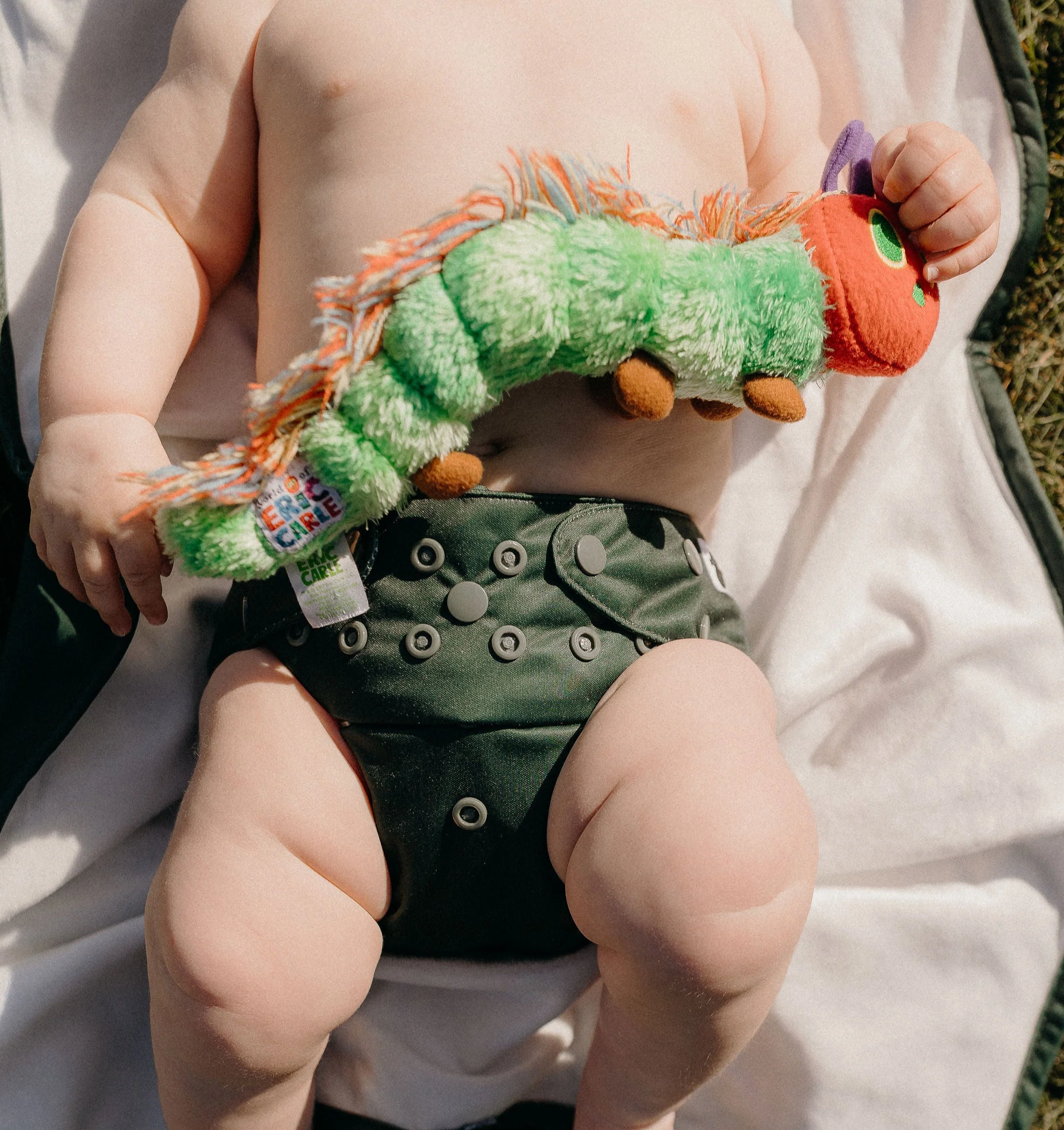 Close-up of Forest Green OSFM Nappy showcasing waterproof layer