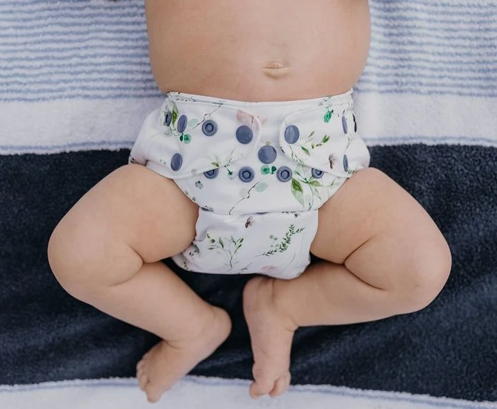 Close-up of snap buttons on Pansy Paradise nappy