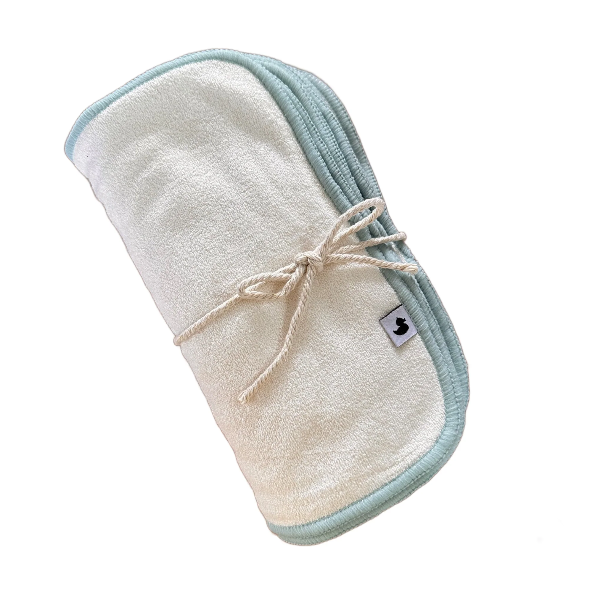 Wipes being used on a baby's face during a nappy change
