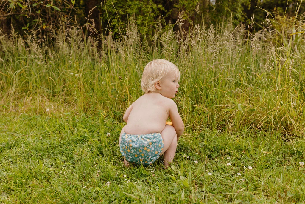 Close-up of the Posey print on a reusable cloth nappy